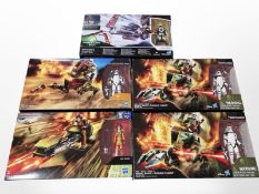Three Hasbro Disney Star Wars Assault Walker figures, an Ezra Bridger's Speeder figure,
