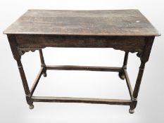 An early 19th century oak side table,