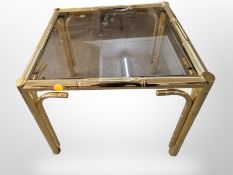 A Scandinavian bamboo effect brass framed smoked glass coffee table,