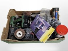 A box of various power and hand tools, bungee cords, etc.