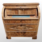 A 19th century continental cylinder front bureau,
