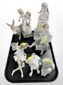 Seven assorted Lladró and Nao figures and groups, tallest 30cm.