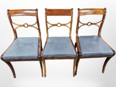 Three inlaid mahogany dining chairs
