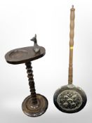 A beech smoker's stand surmounted by a deer, together with a bed-warming pan.