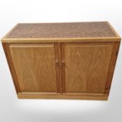 A Danish teak double door low cabinet,