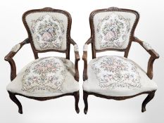 A pair of continental carved salon armchairs in tapestry fabric,