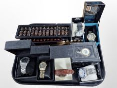 A group of contemporary wrist and pocket watches including Slazenger, together with three abacuses.