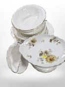 A pair of French Limoges floral porcelain plates,