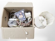 A quantity of lamp bases and wall lights (continental plugs).