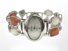 A silver stone set wristwatch