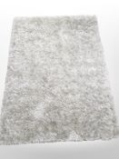 A contemporary machine-made shaggy pile rug, 170cm x 120cm.