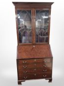 A 20th-century mahogany bureau bookcase, 92cm wide x 51cm deep x 204cm high.