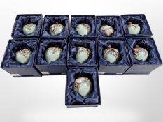 11 matching Old Tupton Ware bulbous floral vases, height 9.5cm, all boxed.