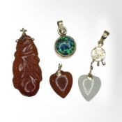 Four gold mounted jade and opal pendants (4)