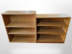 Two 20th century SKM oak veneered open bookcases,