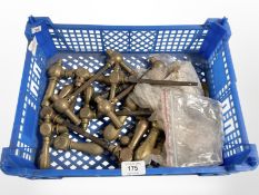 A crate of brass door handles various