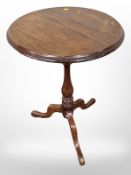 A George III-style mahogany tripod table, height 69cm.