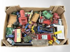 A quantity of vintage play-worn die-cast vehicles including Corgi, Dinky, etc.