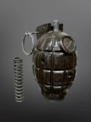 A British Army hand grenade Mills 36 M Mills bomb, with spring (separate), height 10cm.