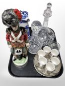 A musical Black Watch ceramic decanter, Ringtons blue and white jug, ship's decanter, two others,