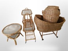A wicker cot, twin handled hamper,