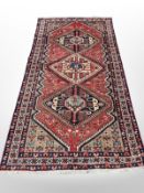 A North West Persian long rug, 296cm x 151cm.