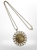 A gold full sovereign 1980 in 9ct gold pendant mount on chain CONDITION REPORT: 18.