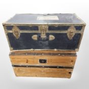 An early 20th century pine domed topped trunk and a further luggage trunk,
