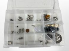 A group of silver jewellery including two viking longship brooches, an amber pendant on chain,