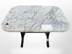 A Scandinavian marble topped table on cast iron support,