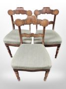 Three 19th century continental carved walnut dining chairs