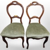 A pair of continental mahogany dining chairs in green dralon