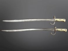 Two French M 1866 Chassepot bayonets, lacking scabbards.