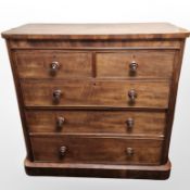 A Victorian mahogany five drawer chest,