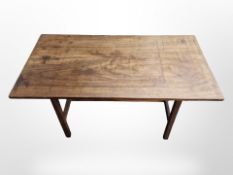 A rectangular teak refectory style table,