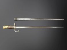 A French M 1874 Gras sabre bayonet with scabbard, blade etched 'Steyr 1879'.