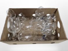 A quantity of wine glasses including several oversized examples.