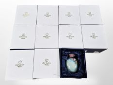 11 matching Old Tupton Ware floral bulbous pottery vases, height 11cm, all boxed.