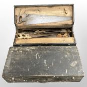 Two antique joiner's tool boxes, one containing hand saws.