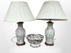 A pair of Oriental style earthen ware table lamps with shades,