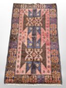 A Balouch rug, 144cm x 84cm.