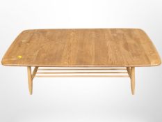 An Ercol elm and beech coffee table with under shelf,