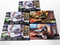 Three Hasbro Disney Star Wars Enfys Nest's Swoop Bike figures, an Ezra Bridger's Speeder figure,