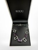 A silver fancy link necklace