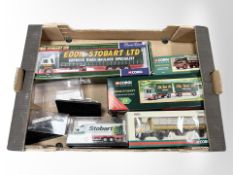 A group of Corgi Eddie Stobart die-cast haulage vehicles,