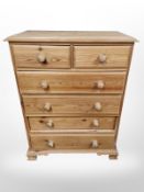 A pine six drawer chest,