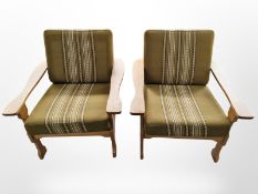 A pair of 20th century Danish blond oak armchairs,