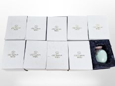 12 matching Old Tupton Ware floral bulbous pottery vases, height 11cm, all boxed.