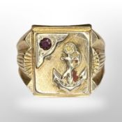A gold signet ring inset with a ruby, size W. CONDITION REPORT: 5.1g.