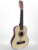 A half-size acoustic guitar